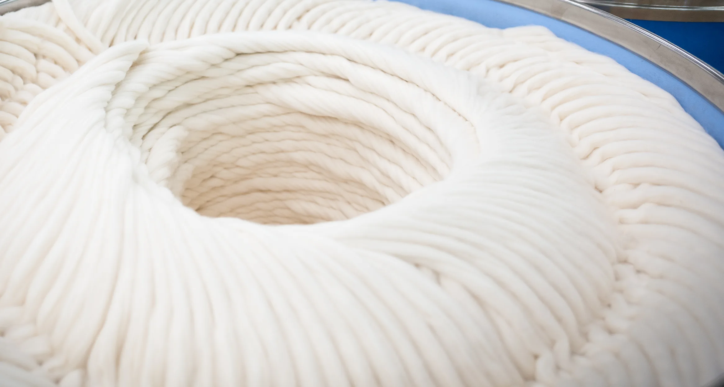 Coiled cotton sliver in a spinning mill